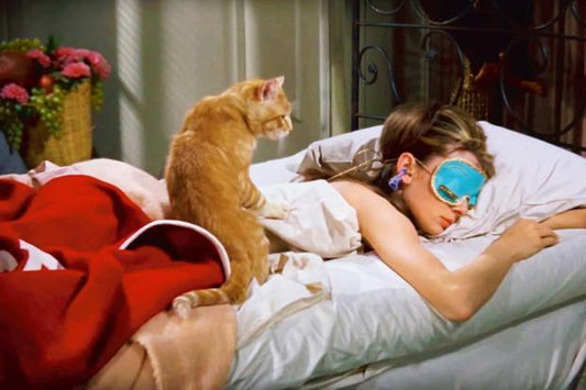 Audrey Hepburn sleeping. Does sleeping cause breakouts? Pillow hygiene via pimple patch brand ZitSticka